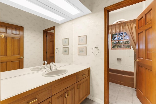 3772 Woodridge Pl, Palm Harbor, FL 34684 - full bath with wallpapered walls, vanity, a tub to relax in, and tile patterned flooring