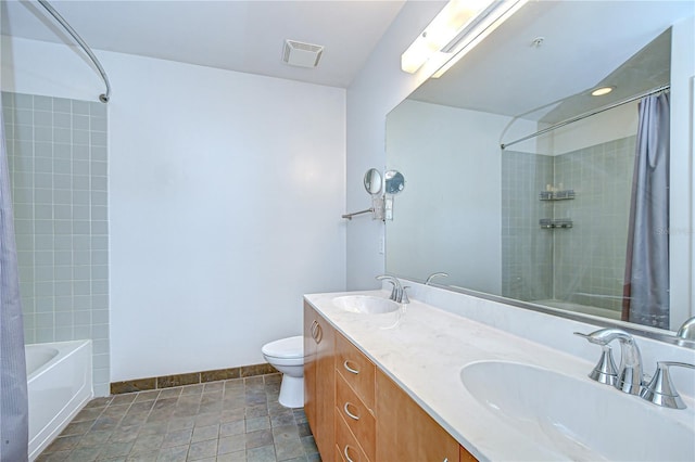 2001 E 2nd Ave Unit 12, Tampa, FL 33605 - bathroom with shower / bathtub combination with curtain and double vanity