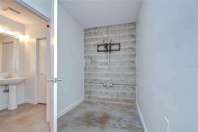 2001 E 2nd Ave Unit 12, Tampa, FL 33605 - bathroom with unfinished concrete flooring