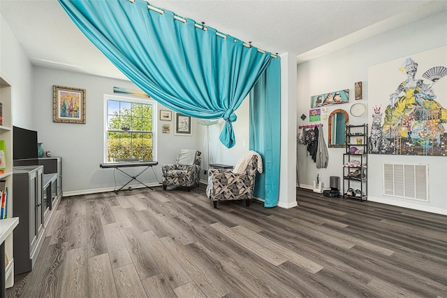 247 Winthrop Dr, Spring Hill, FL 34609 - sitting room featuring wood finished floors and baseboards