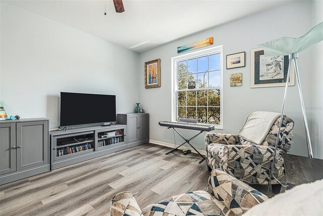 247 Winthrop Dr, Spring Hill, FL 34609 - sitting room with light wood-style floors and ceiling fan