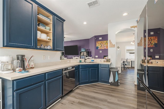 247 Winthrop Dr, Spring Hill, FL 34609 - kitchen with dishwasher, blue cabinets, open shelves, light wood finished floors, and light countertops