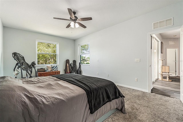 247 Winthrop Dr, Spring Hill, FL 34609 - bedroom with carpet floors and a ceiling fan