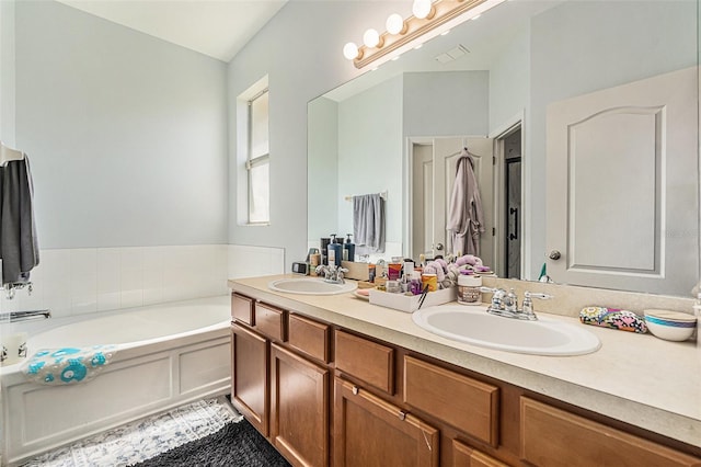 247 Winthrop Dr, Spring Hill, FL 34609 - full bathroom with double vanity and a bath
