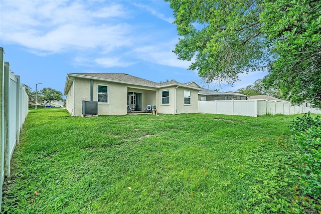 247 Winthrop Dr, Spring Hill, FL 34609 - back of property featuring stucco siding