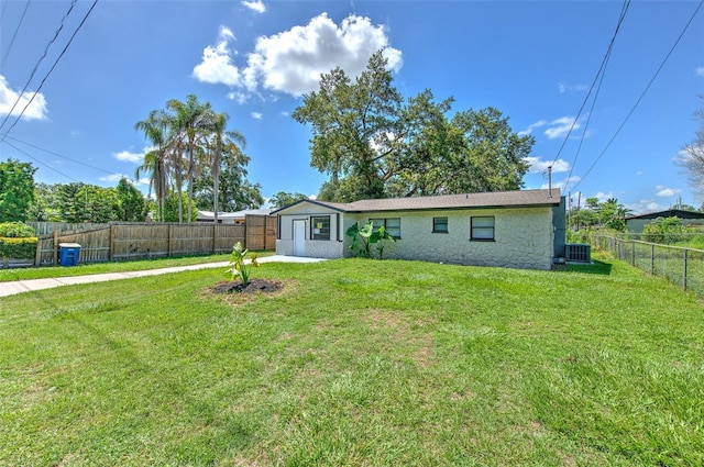 475 W Ethelene St, Bartow, FL 33830 - back of property featuring stone siding and a fenced backyard