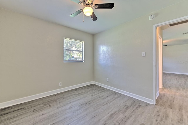 475 W Ethelene St, Bartow, FL 33830 - spare room featuring wood finished floors, a smoke detector, and ceiling fan