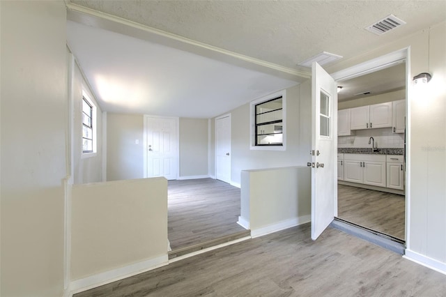 475 W Ethelene St, Bartow, FL 33830 - empty room featuring light wood-style floors and a textured ceiling