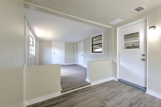 475 W Ethelene St, Bartow, FL 33830 - spare room with wood finished floors and a textured ceiling