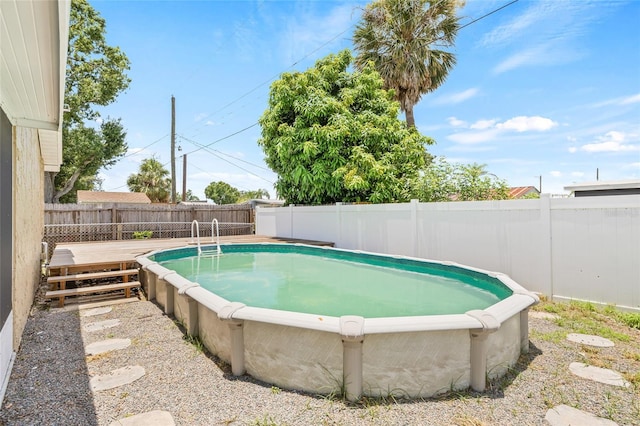 6012 Flora Ter, Apollo Beach, FL 33572 - view of swimming pool with a fenced backyard