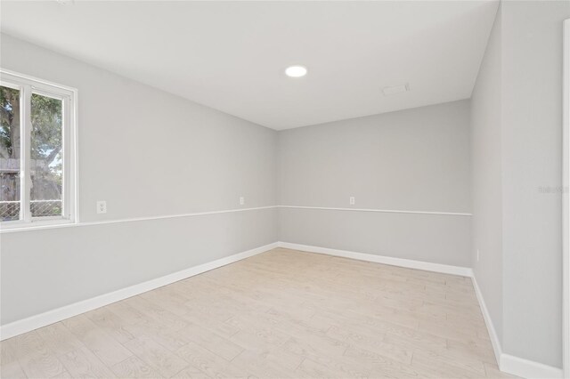 6012 Flora Ter, Apollo Beach, FL 33572 - unfurnished room with wood finished floors and recessed lighting