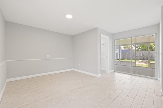 6012 Flora Ter, Apollo Beach, FL 33572 - unfurnished room featuring light wood-type flooring and recessed lighting