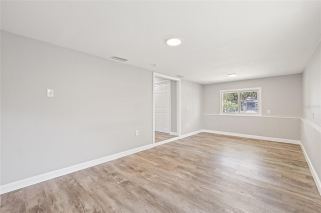 6012 Flora Ter, Apollo Beach, FL 33572 - spare room featuring wood finished floors