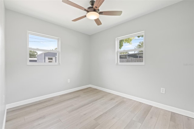 6012 Flora Ter, Apollo Beach, FL 33572 - empty room featuring light wood-type flooring and a ceiling fan