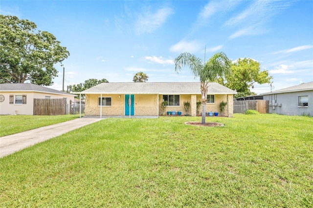 6012 Flora Ter, Apollo Beach, FL 33572 - ranch-style house with stucco siding and driveway