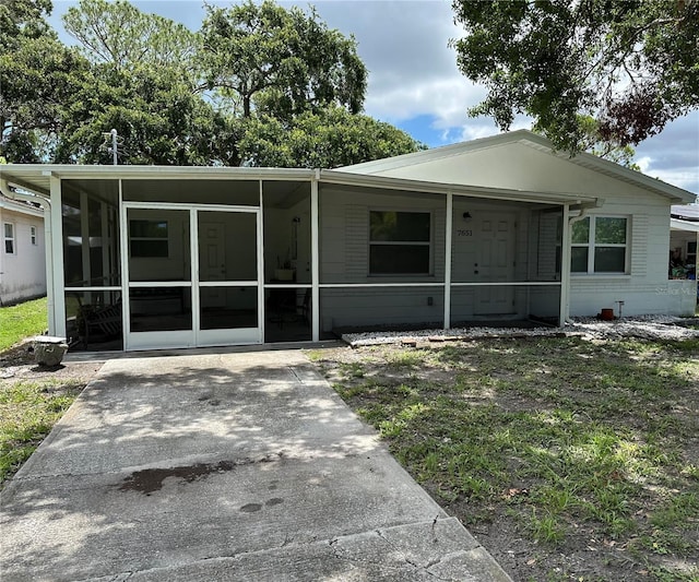 7651 46th Way N, Pinellas Park, FL 33781 - view of front of property with a sunroom