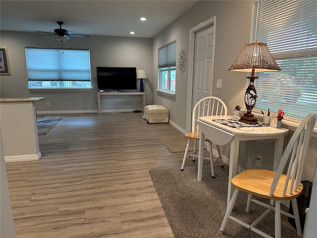 7651 46th Way N, Pinellas Park, FL 33781 - dining space with light wood-style floors, a ceiling fan, and recessed lighting