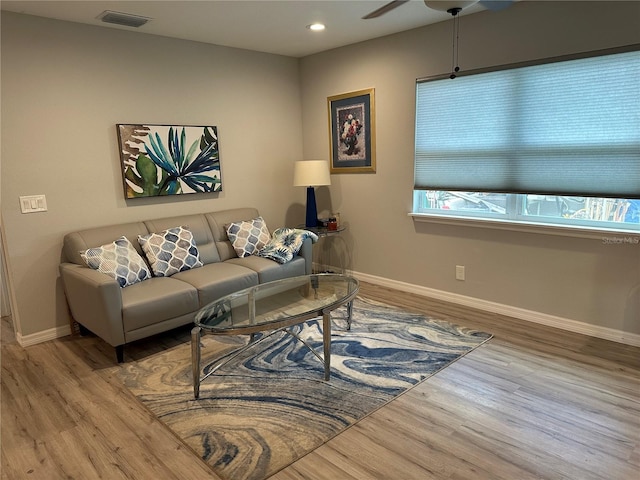 7651 46th Way N, Pinellas Park, FL 33781 - living area with wood finished floors, a ceiling fan, and recessed lighting