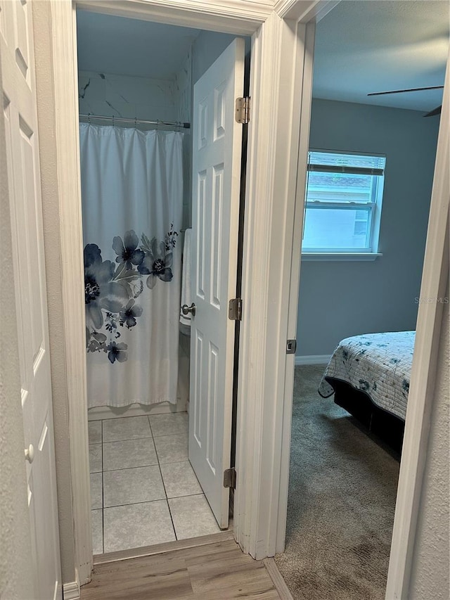 7651 46th Way N, Pinellas Park, FL 33781 - hall featuring baseboards and light wood-style floors