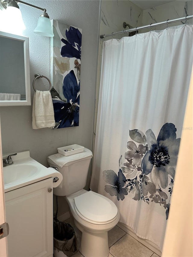 7651 46th Way N, Pinellas Park, FL 33781 - full bathroom with tile patterned floors, vanity, and curtained shower