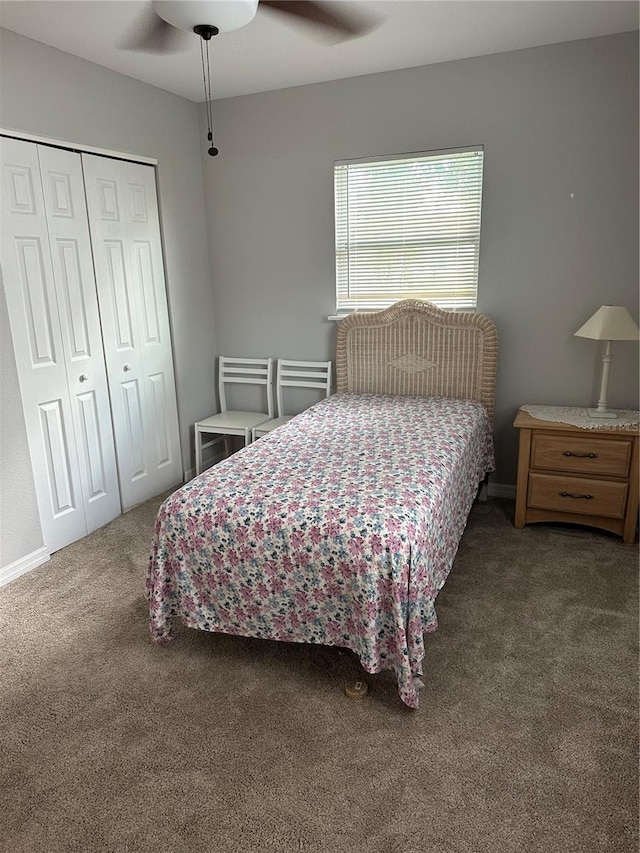 7651 46th Way N, Pinellas Park, FL 33781 - bedroom with carpet flooring, a closet, and ceiling fan