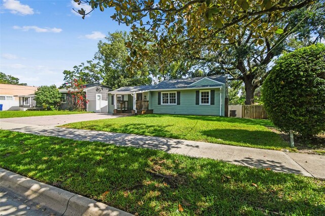 1208 E Crenshaw St, Tampa, FL 33604 - ranch-style home with concrete driveway