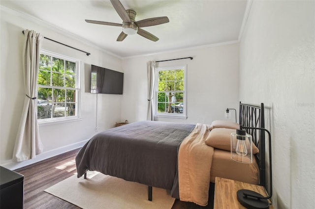 1208 E Crenshaw St, Tampa, FL 33604 - bedroom with wood finished floors, crown molding, and a ceiling fan