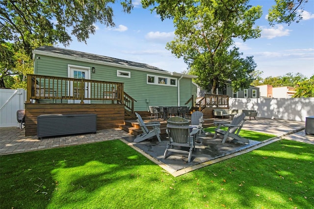 1208 E Crenshaw St, Tampa, FL 33604 - back of property featuring a patio and a deck
