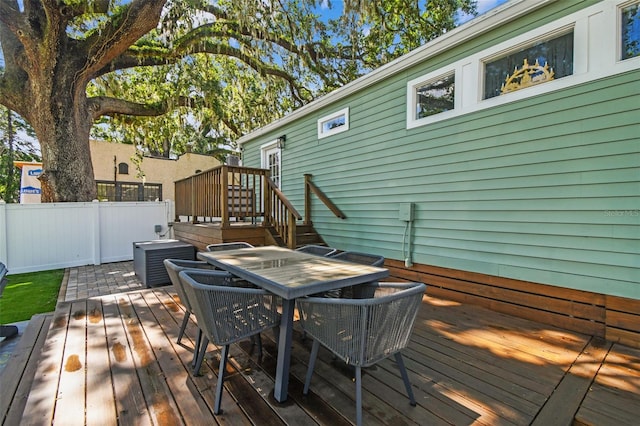 1208 E Crenshaw St, Tampa, FL 33604 - wooden terrace with outdoor dining space