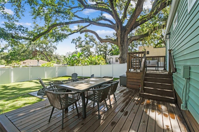 1208 E Crenshaw St, Tampa, FL 33604 - deck featuring outdoor dining area and a fenced backyard