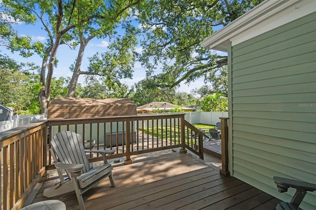 1208 E Crenshaw St, Tampa, FL 33604 - wooden terrace with a fenced backyard