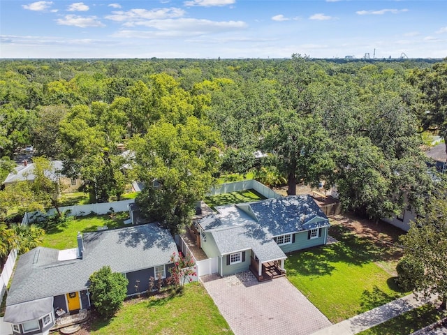 1208 E Crenshaw St, Tampa, FL 33604 - aerial view of property and surrounding area featuring a forest