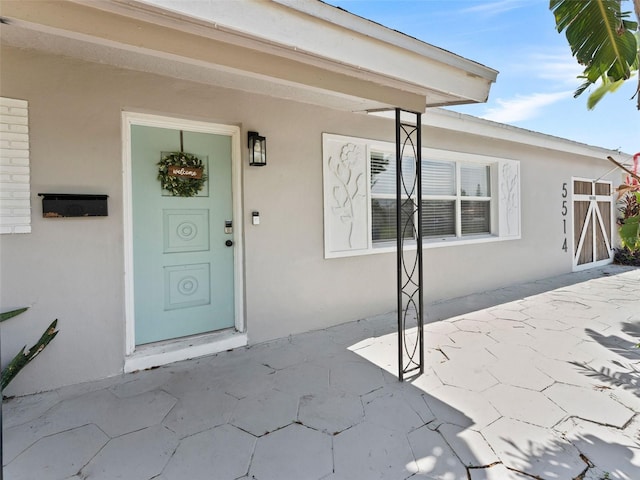 5514 7th Ave N, Saint Petersburg, FL 33710 - entrance to property featuring stucco siding