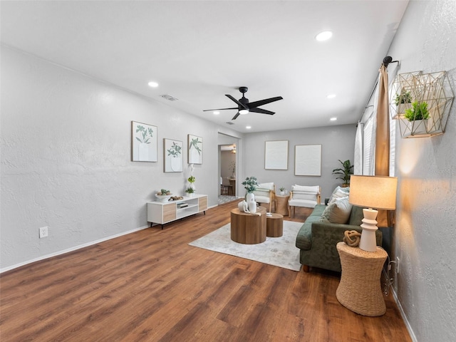 5514 7th Ave N, Saint Petersburg, FL 33710 - living room featuring wood finished floors, recessed lighting, a textured wall, and ceiling fan
