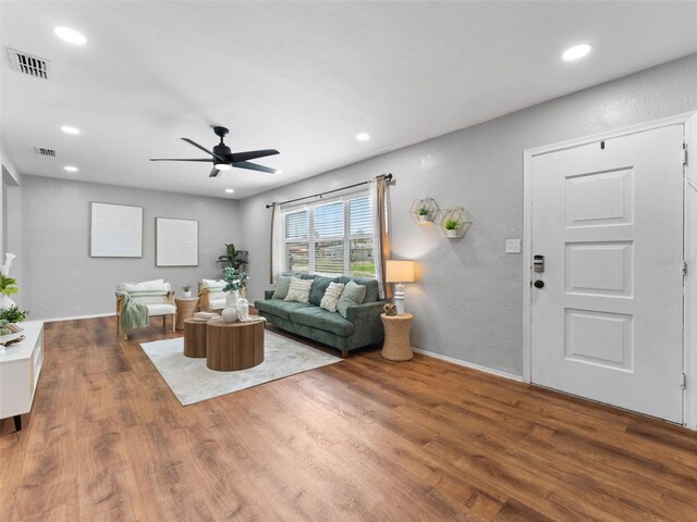 5514 7th Ave N, Saint Petersburg, FL 33710 - living area with a ceiling fan, wood finished floors, and recessed lighting