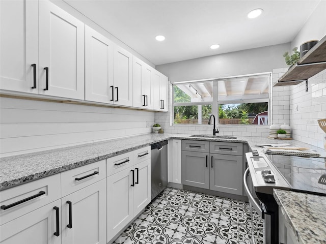 5514 7th Ave N, Saint Petersburg, FL 33710 - kitchen featuring appliances with stainless steel finishes, backsplash, open shelves, white cabinetry, and recessed lighting