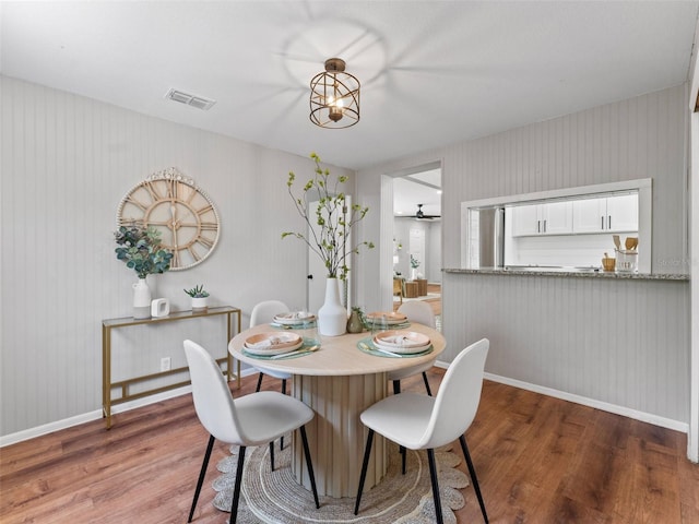 5514 7th Ave N, Saint Petersburg, FL 33710 - dining room featuring wood finished floors