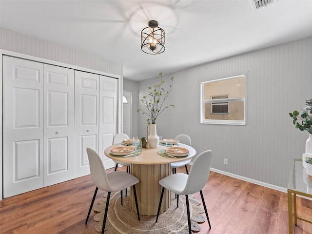 5514 7th Ave N, Saint Petersburg, FL 33710 - dining space featuring wood finished floors