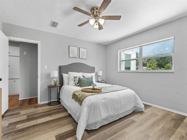 5514 7th Ave N, Saint Petersburg, FL 33710 - bedroom with wood finished floors and ceiling fan