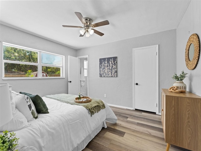 5514 7th Ave N, Saint Petersburg, FL 33710 - bedroom featuring wood finished floors and a ceiling fan