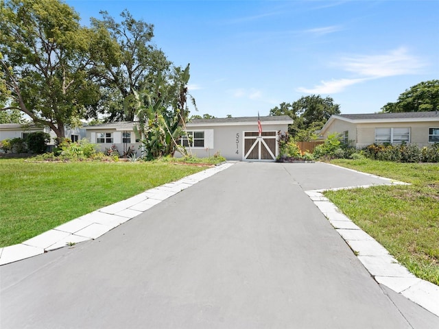 5514 7th Ave N, Saint Petersburg, FL 33710 - single story home featuring a front yard and stucco siding