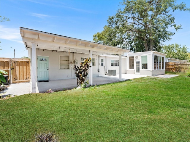 5514 7th Ave N, Saint Petersburg, FL 33710 - rear view of property featuring a patio, a fenced backyard, and a pergola