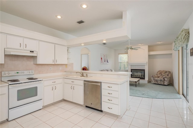 1156 Ridgegrove Dr W, Palm Harbor, FL 34683 - kitchen with white electric range oven, dishwasher, under cabinet range hood, a peninsula, and light countertops
