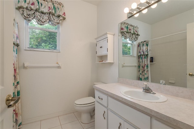1156 Ridgegrove Dr W, Palm Harbor, FL 34683 - full bathroom with tile patterned floors, healthy amount of natural light, vanity, and a shower with curtain