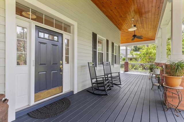 523 2nd Ave SW, Lutz, FL 33548 - wooden porch with a ceiling fan