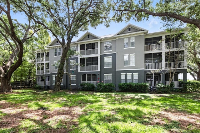 1201 High Hammock Dr Unit 302, Tampa, FL 33619 - view of apartment building / complex