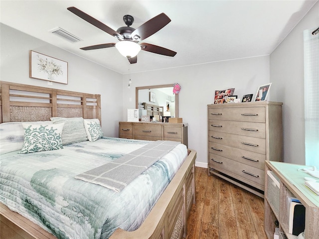 8110 Damara Dr, New Port Richey, FL 34653 - bedroom with hardwood / wood-style flooring and ceiling fan