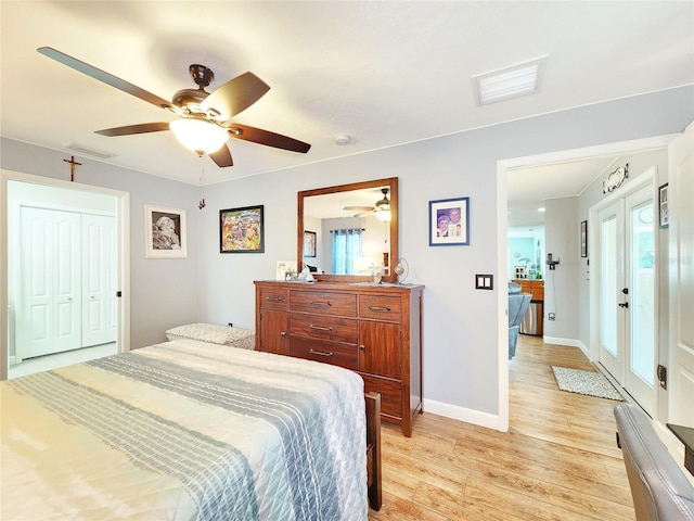 8110 Damara Dr, New Port Richey, FL 34653 - bedroom featuring light wood finished floors, ceiling fan, and multiple windows