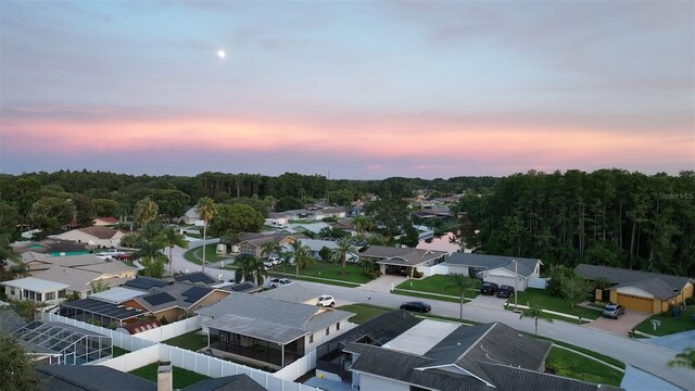 8110 Damara Dr, New Port Richey, FL 34653 - aerial view at dusk of a residential view