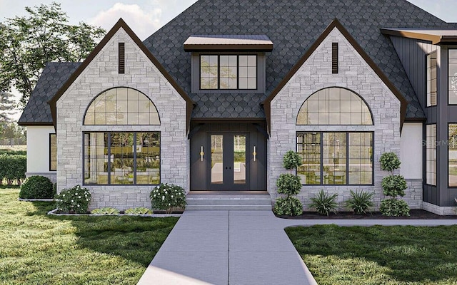 125 Avonwood, Tampa, FL 33625 - french country inspired facade featuring stone siding, a front lawn, and french doors